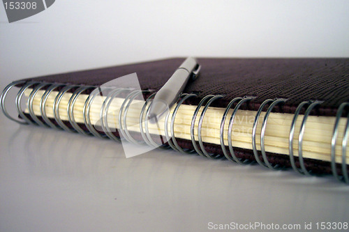 Image of pen on leather cover