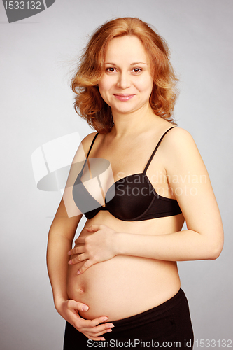 Image of Smiling pregnant woman
