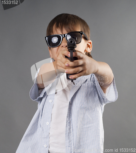 Image of Boy with a weapon