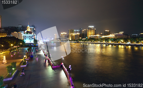 Image of Aerial image of a modern city by a river 