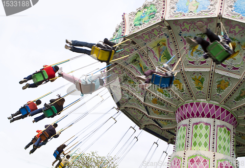 Image of chain swing ride in amusement park 