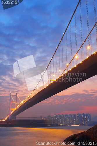 Image of long bridge in sunset hour