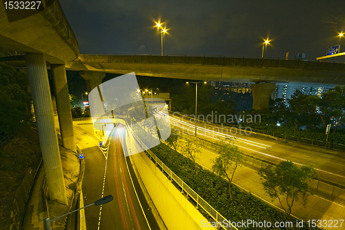 Image of Modern Urban City with Freeway Traffic at Night