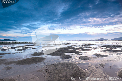Image of sunset shingle coast in hong kong 