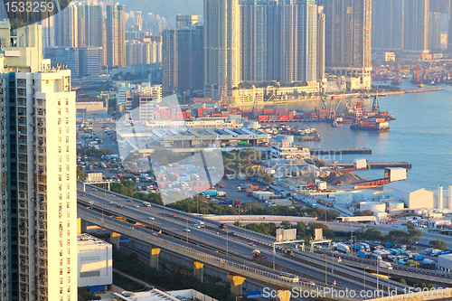 Image of highway in city downtown at day