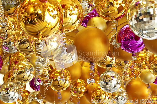 Image of background made of christmas balls and tinsel 