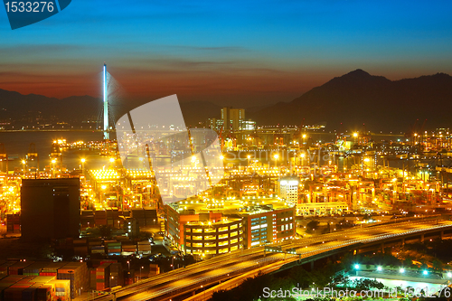 Image of sunset in cargo container terminal