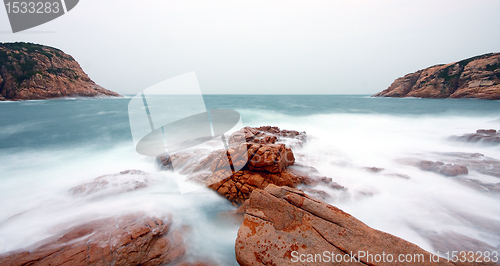 Image of rocky sea coast and blurred water in shek o,hong kong 