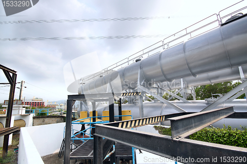 Image of Big gas container against sky 