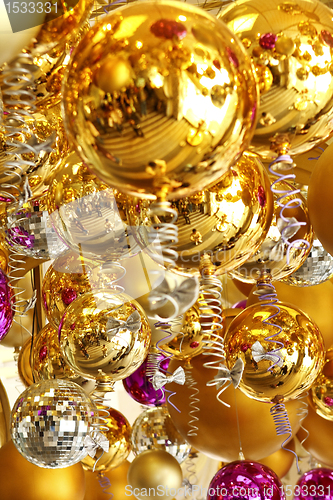 Image of background made of christmas balls and tinsel 