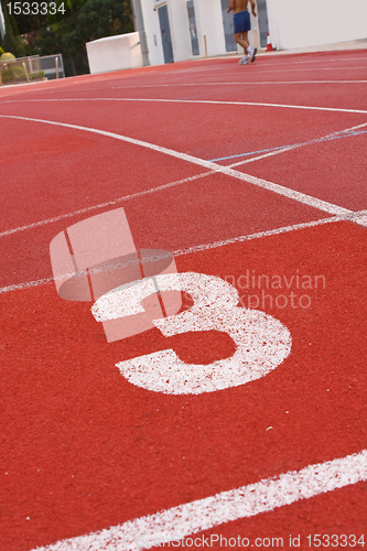 Image of Running track numbers one two three in stadium 