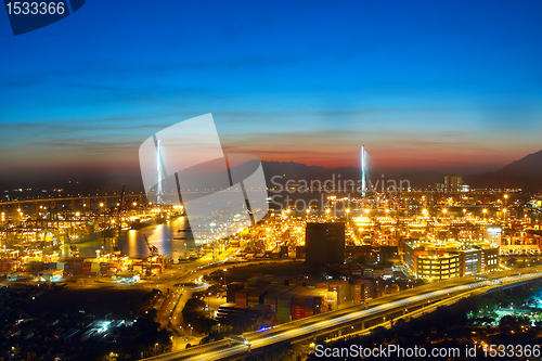 Image of sunset in cargo container terminal