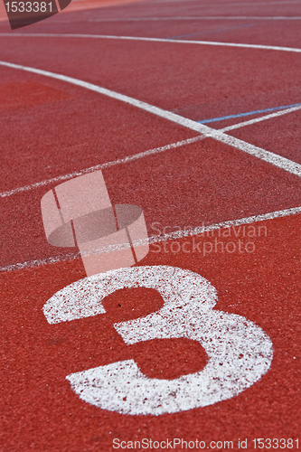 Image of Running track numbers one two three in stadium 