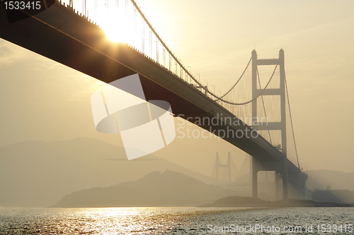 Image of long bridge in sunset hour