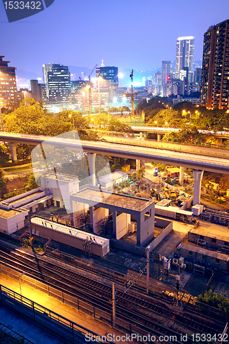 Image of City and train rail, sunset moment