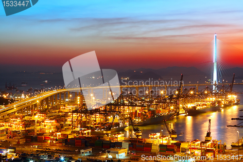 Image of sunset in cargo container terminal