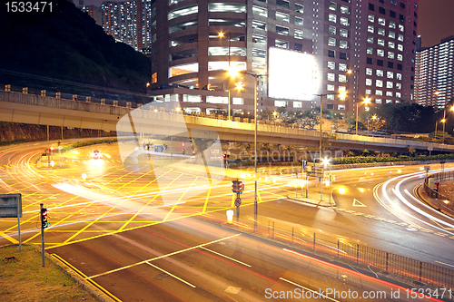 Image of traffic in modern city at night