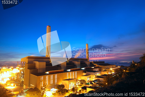 Image of coal power station and night blue sky 