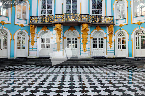 Image of fragment of luxurious old house with stucco