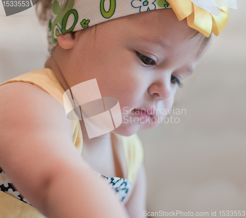 Image of Little girl in yellow dress