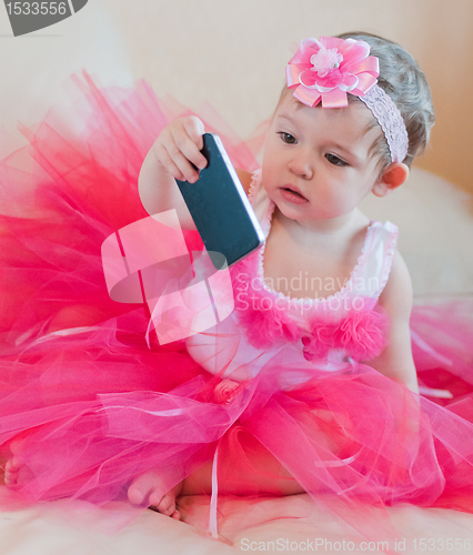 Image of Little girl in the pink dress