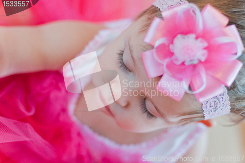 Image of Little girl in the pink dress