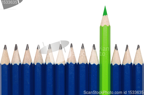 Image of Green crayon standing out from the crowd
