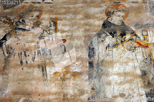 Image of Monks on the wall