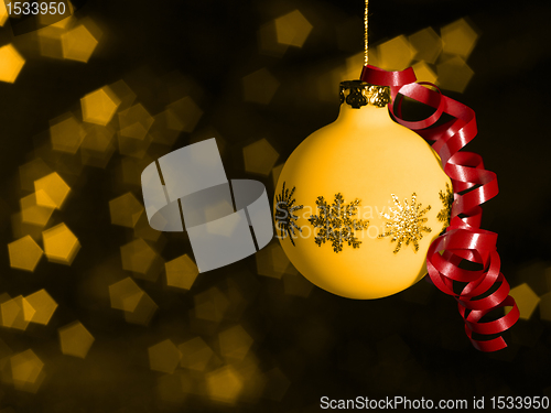 Image of Christmas bauble in blurry back