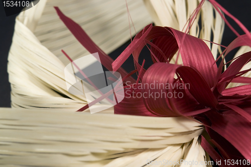 Image of decorative red and light brown bow