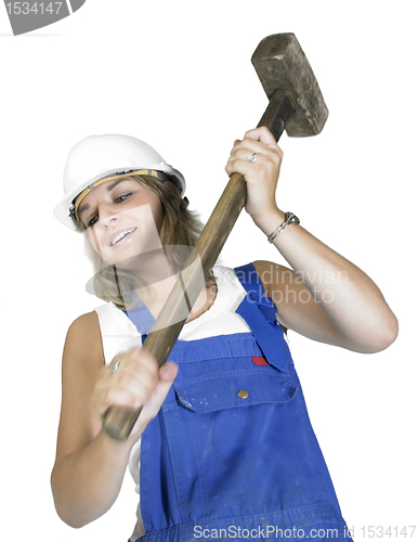 Image of cute girl while hammering