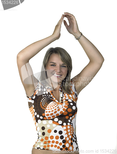 Image of blond girl clapping her hands over head