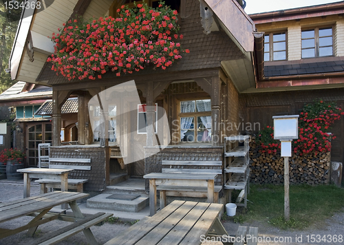 Image of entrance of a wooden house