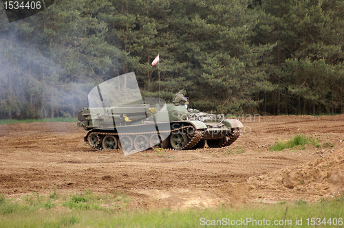 Image of offroad scenery with driving tank