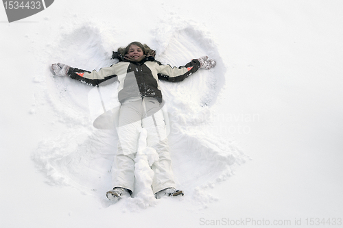 Image of girl having fun in the snow