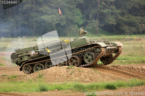 Image of offroad scenery with driving tank