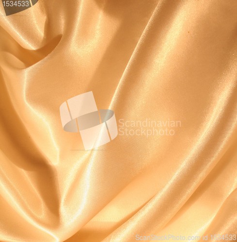 Image of Smooth elegant golden silk as background