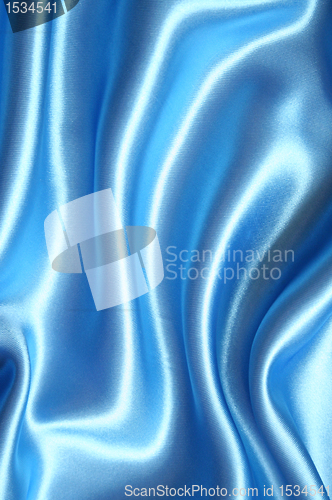 Image of Smooth elegant blue silk as background 