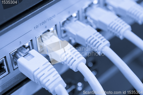 Image of network cables connected to switch