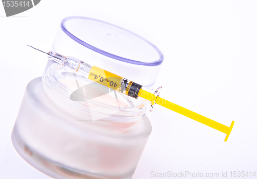 Image of botox cream with syringe