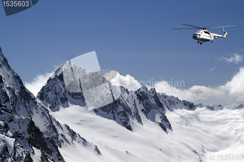 Image of Helicopter in high mountains