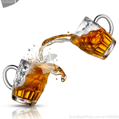 Image of Beer splash in glasses isolated on white