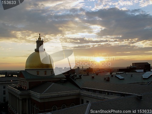 Image of Sun set on State House in Boston on Beacon Street