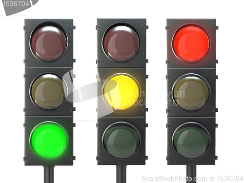 Image of Set of traffic lights with red, yellow and green lights