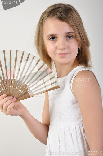 Image of child with a fan