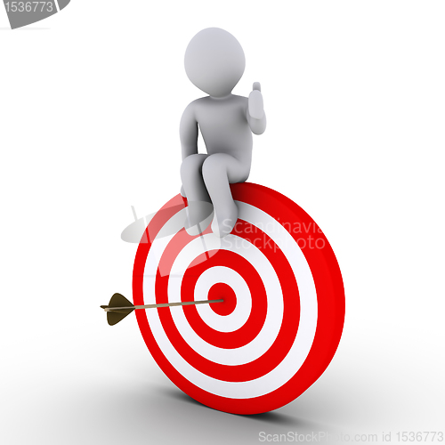 Image of Person sitting on target with arrow