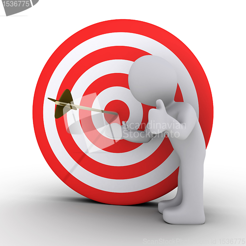 Image of Person satisfied is showing an arrow in the center of target