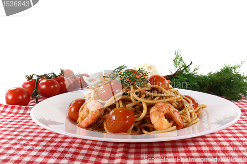 Image of Spaghetti with shrimp and tomatoes