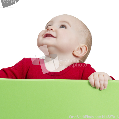 Image of young child holding shield