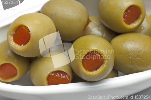 Image of olives filled with red paste